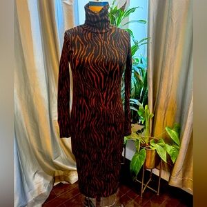 90s body con animal print dress. Mitty length size small perfect fall piece.